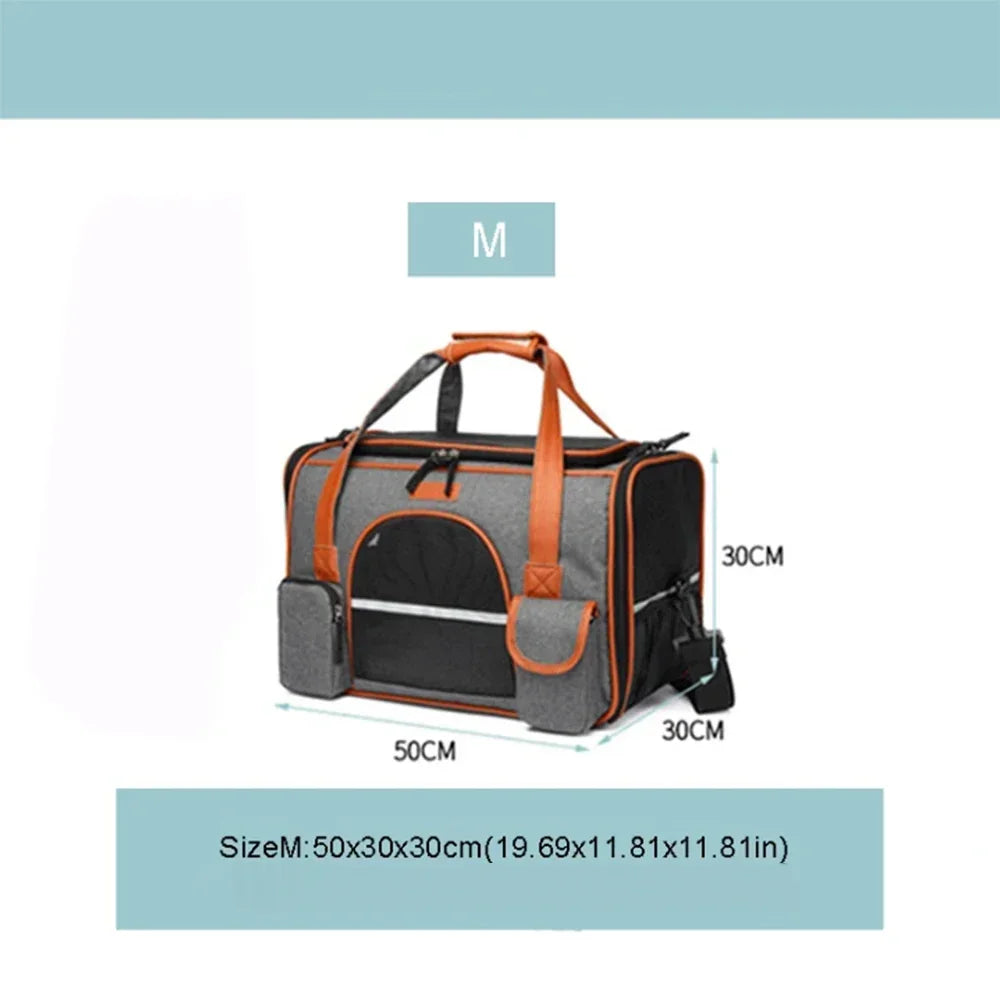 Pet carrier with orange accents and dimensions on a light blue background